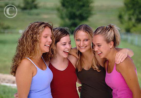 Group_of_Teenage_Girls_Laughing_Outdoors_700_00064202.jpg