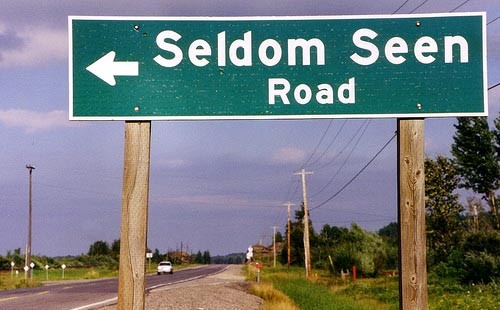 funny_road_signs_seldom_seen_road.jpg