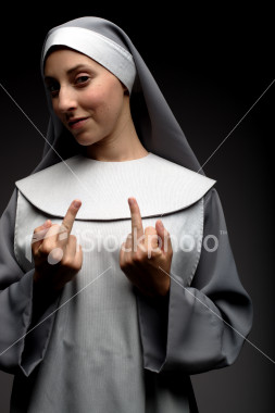 istockphoto_788701_woman_dressed_as_nun_giving_middle_finger_gesture_1.jpg
